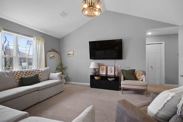 925 Kelli Ct, Centralia, MO 65240 - living area with lofted ceiling, carpet floors, and a chandelier