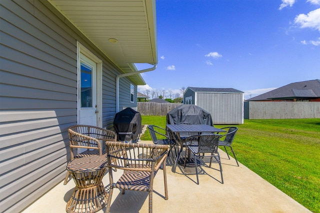 925 Kelli Ct, Centralia, MO 65240 - view of patio / terrace featuring a shed, outdoor dining area, and a grill
