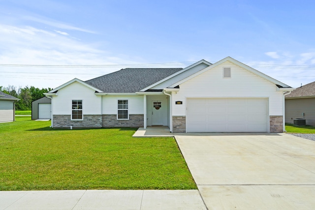 506 Addie Ln, Centralia, MO 65240 - view of front of house with driveway, a front yard, an attached garage, stone siding, and a shingled roof