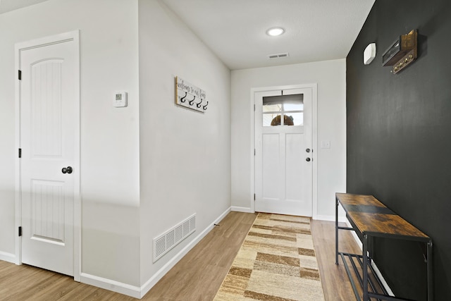 506 Addie Ln, Centralia, MO 65240 - foyer with wood finished floors and recessed lighting