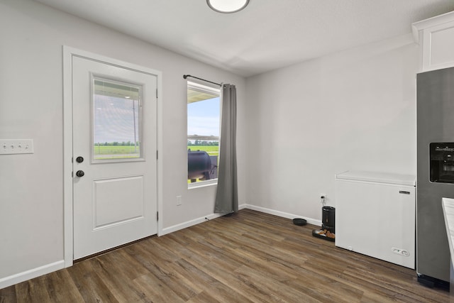 506 Addie Ln, Centralia, MO 65240 - unfurnished dining area with wood finished floors