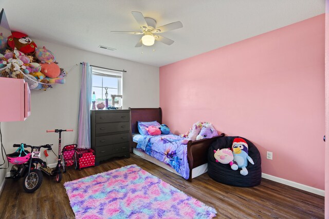 506 Addie Ln, Centralia, MO 65240 - bedroom with wood finished floors and ceiling fan