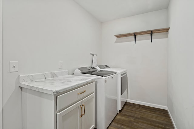 506 Addie Ln, Centralia, MO 65240 - laundry room featuring washing machine and clothes dryer, cabinet space, and dark wood-type flooring