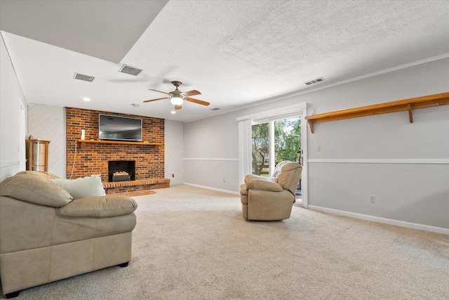133 Manview Ln, Holts Summit, MO 65043 - carpeted living area with a brick fireplace, a ceiling fan, and a textured ceiling