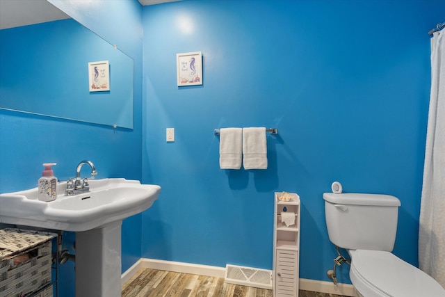 133 Manview Ln, Holts Summit, MO 65043 - bathroom with toilet and wood finished floors