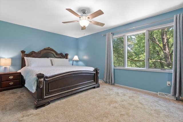 133 Manview Ln, Holts Summit, MO 65043 - carpeted bedroom with ceiling fan and baseboards