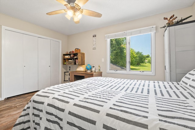 133 Manview Ln, Holts Summit, MO 65043 - bedroom featuring wood finished floors, a closet, and ceiling fan