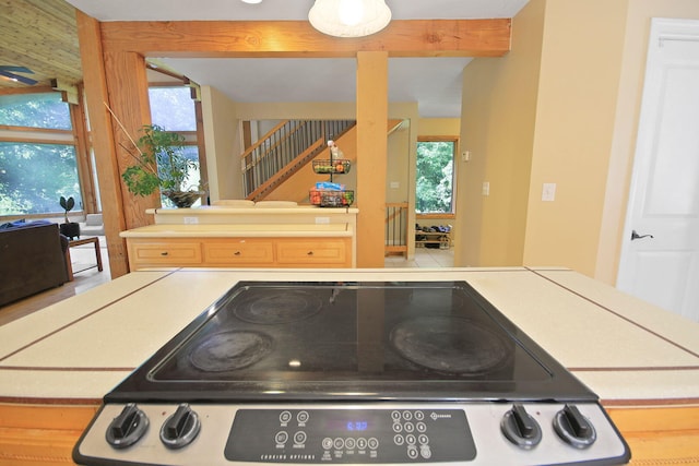 4241 E Ketterer Rd, Columbia, MO 65202 - kitchen featuring electric stove and beamed ceiling