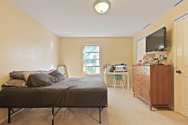 4241 E Ketterer Rd, Columbia, MO 65202 - bedroom featuring light carpet and baseboards