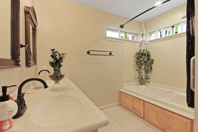 4241 E Ketterer Rd, Columbia, MO 65202 - full bathroom featuring a bath, tile patterned floors, and double vanity