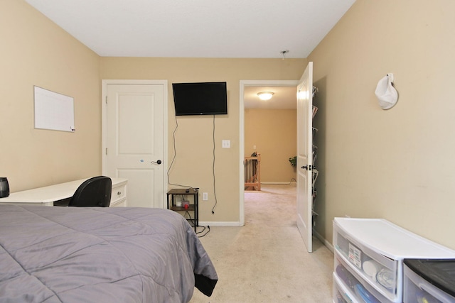 4241 E Ketterer Rd, Columbia, MO 65202 - bedroom featuring light colored carpet and baseboards