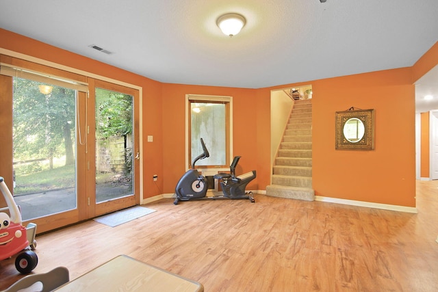4241 E Ketterer Rd, Columbia, MO 65202 - exercise area with baseboards and wood finished floors