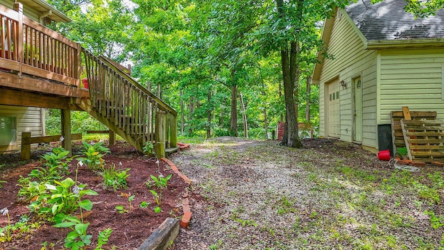 4241 E Ketterer Rd, Columbia, MO 65202 - view of yard with stairway and a wooden deck