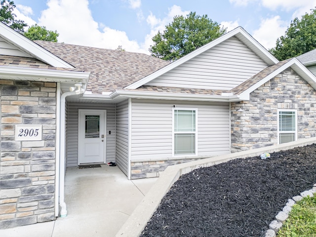 2905 N N Garth Ave, Columbia, MO 65202 - entrance to property with stone siding and a shingled roof