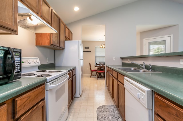 1703 Osage Dr, Columbia, MO 65202 - kitchen with white appliances, custom exhaust hood, lofted ceiling, brown cabinets, and recessed lighting
