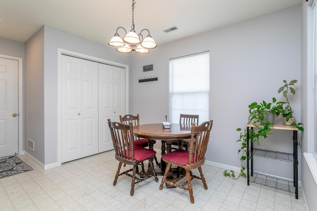 1703 Osage Dr, Columbia, MO 65202 - dining room with a chandelier and light flooring