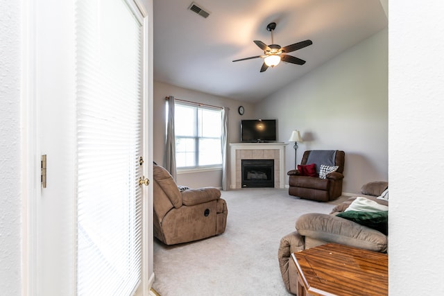 1703 Osage Dr, Columbia, MO 65202 - living area with vaulted ceiling, carpet floors, a ceiling fan, and a fireplace