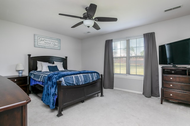 1703 Osage Dr, Columbia, MO 65202 - carpeted bedroom with baseboards and ceiling fan