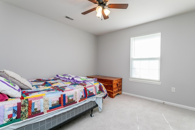 1703 Osage Dr, Columbia, MO 65202 - carpeted bedroom with baseboards and a ceiling fan