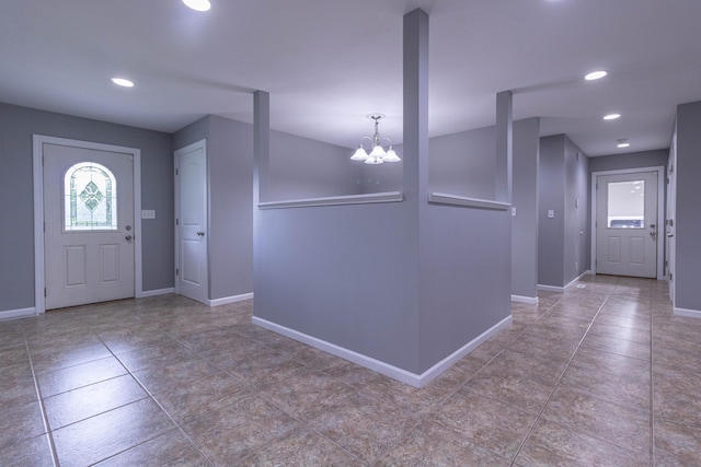7700 N Ballew Rd, Hallsville, MO 65255 - foyer entrance featuring a chandelier, recessed lighting, and tile patterned flooring