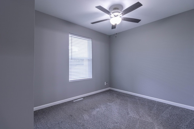 7700 N Ballew Rd, Hallsville, MO 65255 - spare room featuring carpet floors and a ceiling fan