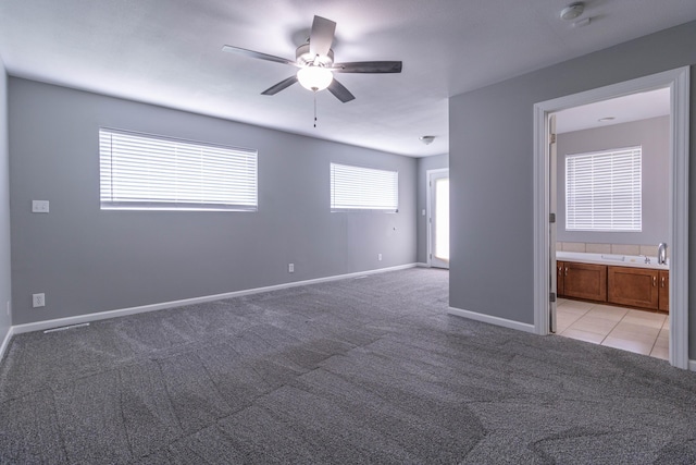 7700 N Ballew Rd, Hallsville, MO 65255 - spare room with a smoke detector, light carpet, and a ceiling fan
