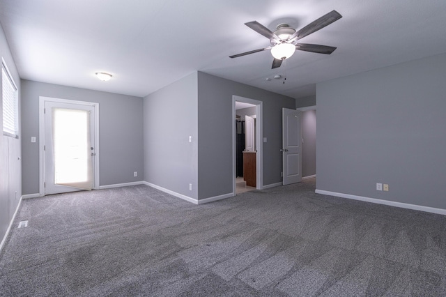 7700 N Ballew Rd, Hallsville, MO 65255 - empty room featuring carpet flooring and ceiling fan