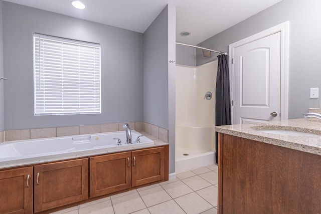 7700 N Ballew Rd, Hallsville, MO 65255 - bathroom featuring a shower stall, tile patterned flooring, a bath, and vanity