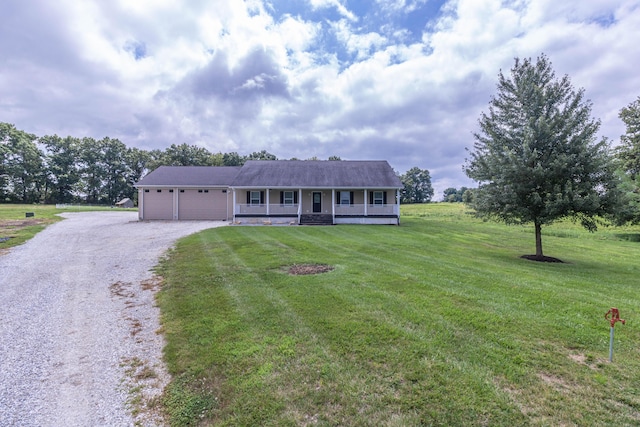 7700 N Ballew Rd, Hallsville, MO 65255 - single story home featuring driveway, covered porch, a garage, and a front yard