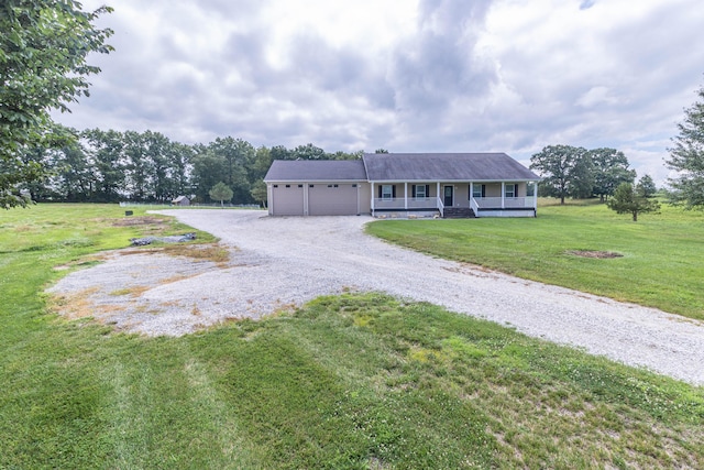 7700 N Ballew Rd, Hallsville, MO 65255 - ranch-style home with a porch, gravel driveway, an attached garage, and a front lawn