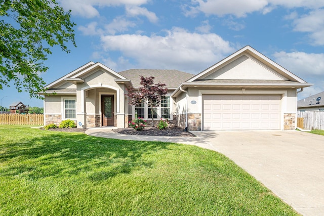 3405 Piranha Ct, Columbia, MO 65202 - view of front of property featuring stone siding, stucco siding, concrete driveway, and a garage