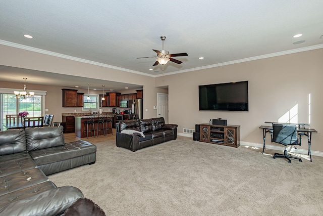 3405 Piranha Ct, Columbia, MO 65202 - living area featuring a chandelier, recessed lighting, ceiling fan, light carpet, and crown molding