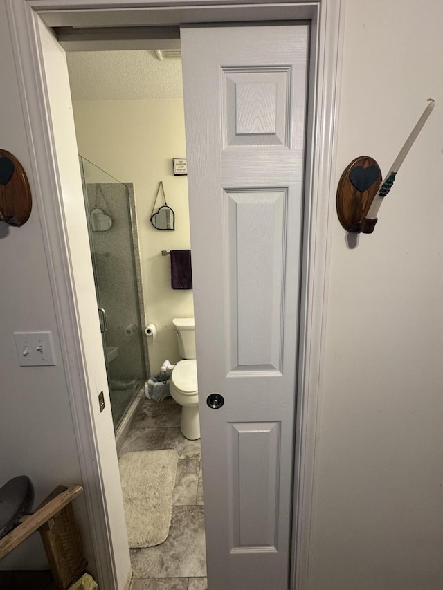 200 W Lakeview Ave, Centralia, MO 65240 - full bathroom featuring a stall shower and toilet
