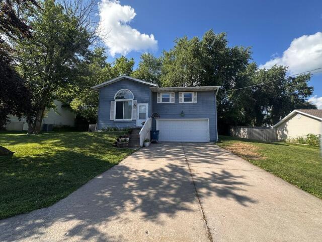 511 Turner Ave, Ashland, MO 65010 - raised ranch featuring a garage and driveway