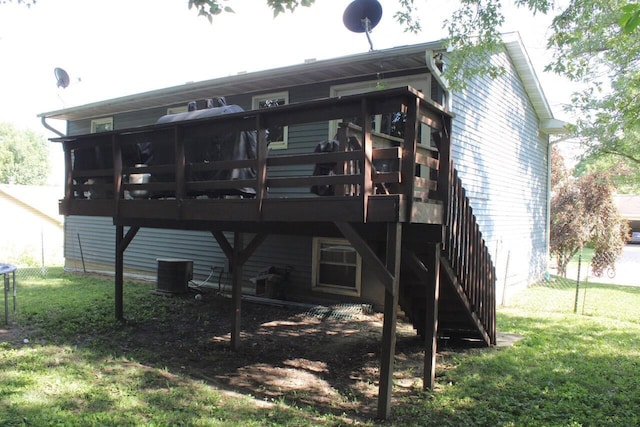 511 Turner Ave, Ashland, MO 65010 - rear view of house featuring a deck and a lawn