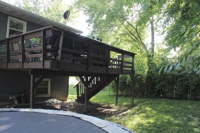 511 Turner Ave, Ashland, MO 65010 - view of side of property with stairs, a deck, and a yard