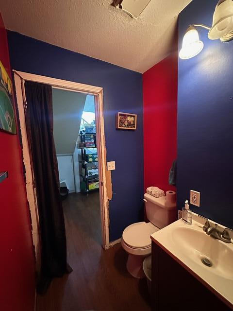 511 Turner Ave, Ashland, MO 65010 - half bath with vanity and wood finished floors