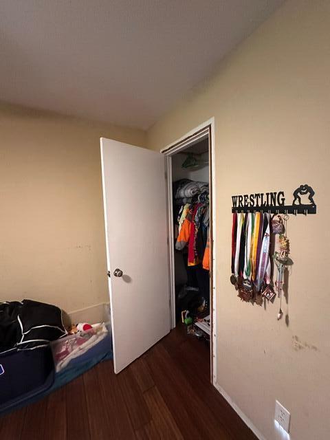 511 Turner Ave, Ashland, MO 65010 - bedroom with dark wood finished floors and a closet