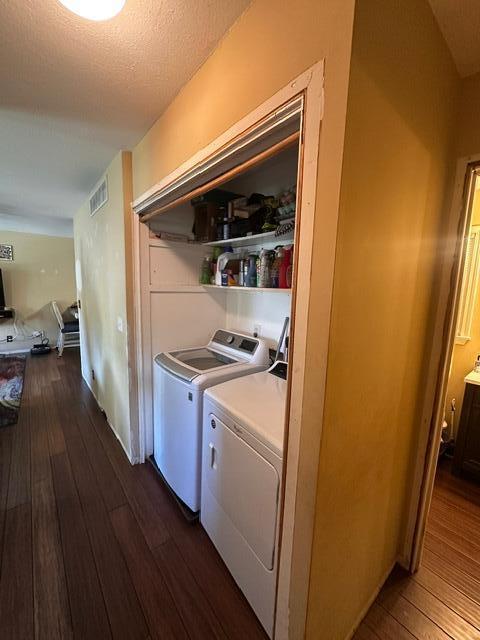 511 Turner Ave, Ashland, MO 65010 - washroom featuring washer and clothes dryer and dark wood finished floors