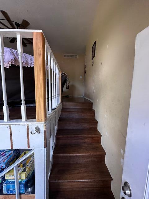 511 Turner Ave, Ashland, MO 65010 - stairs featuring a ceiling fan and wood finished floors