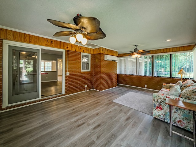 sunroom featuring a wall unit AC