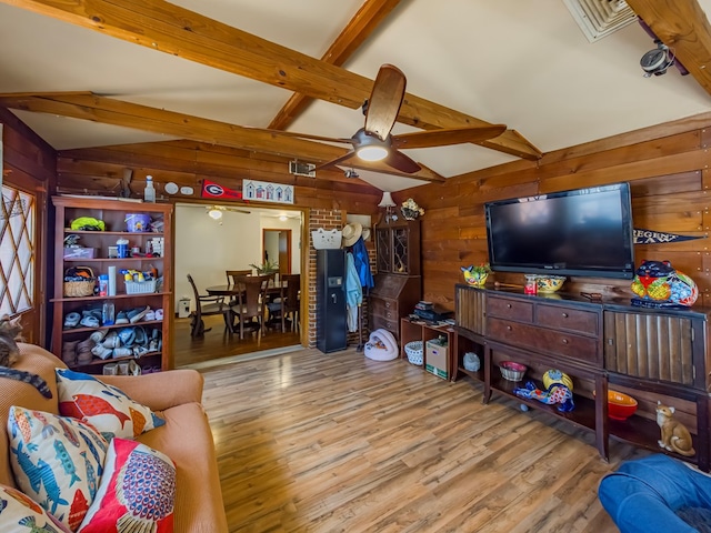 2222 Davis Ave, Tifton, GA 31794 - living area with a ceiling fan, wooden walls, and wood finished floors