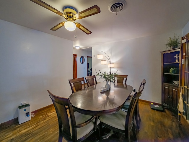 2222 Davis Ave, Tifton, GA 31794 - dining room with ceiling fan, dark wood-style flooring, and baseboards