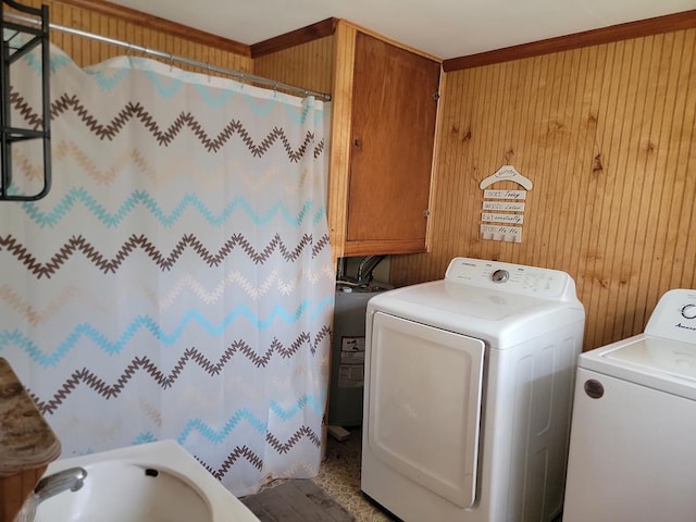 195 N Mattie Ave, Sycamore, GA 31790 - laundry area with washing machine and clothes dryer, wooden walls, and cabinet space