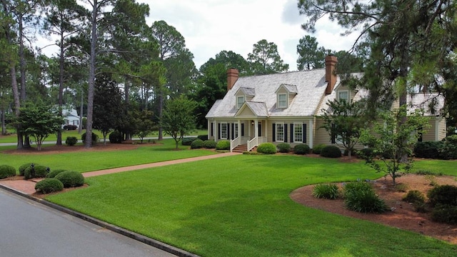 302 W 26th St, Tifton, GA 31794 - cape cod home with a chimney and a front yard