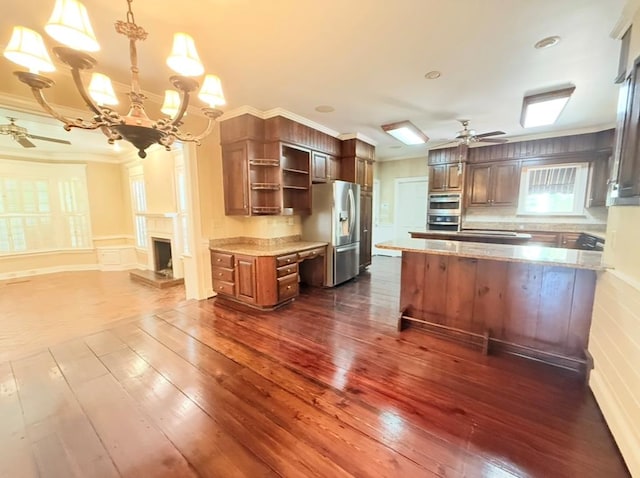 302 W 26th St, Tifton, GA 31794 - kitchen featuring appliances with stainless steel finishes, open shelves, ceiling fan, dark wood-style floors, and crown molding
