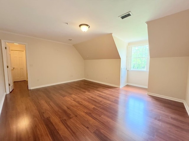 302 W 26th St, Tifton, GA 31794 - additional living space featuring wood finished floors and lofted ceiling