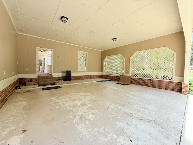 302 W 26th St, Tifton, GA 31794 - misc room featuring concrete floors and brick wall