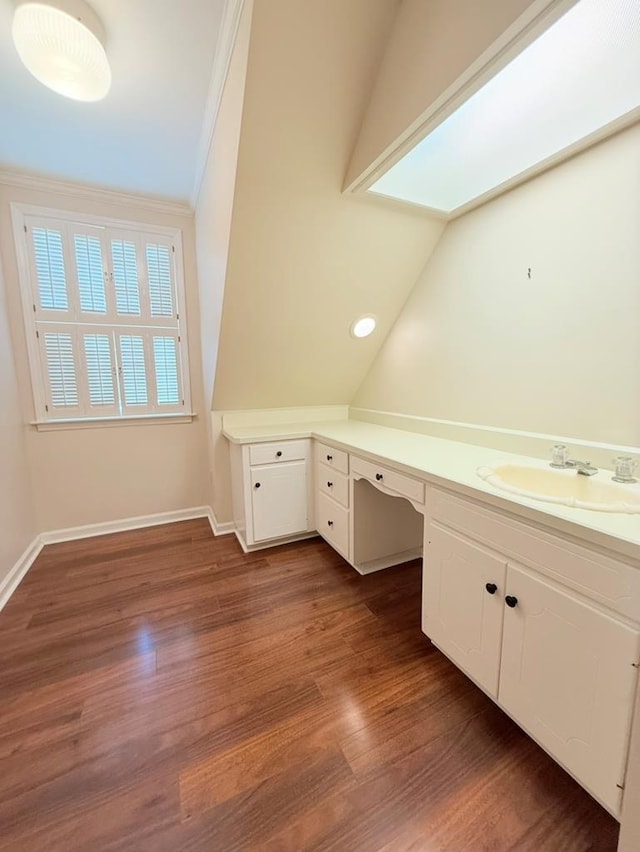 302 W 26th St, Tifton, GA 31794 - bathroom featuring crown molding, wood finished floors, lofted ceiling, and vanity