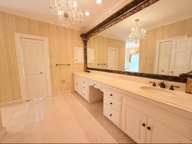 302 W 26th St, Tifton, GA 31794 - bathroom featuring a chandelier, crown molding, a closet, double vanity, and wallpapered walls